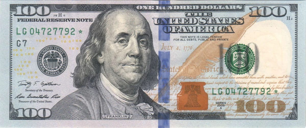 Face of a Series 2009A $100 Federal Reserve star note, serial LG 04727792 with a star