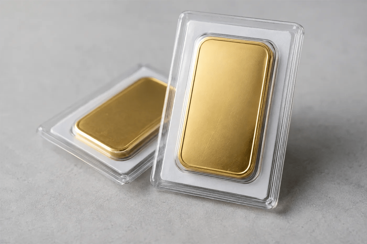 Two 1 oz gold bars sealed in clear assay cards