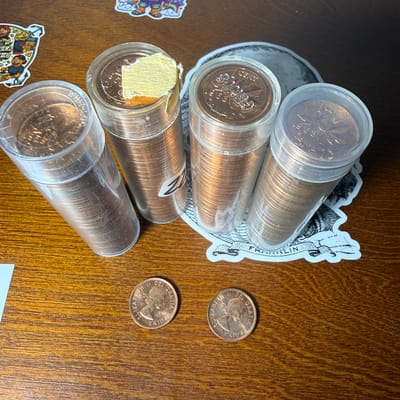 4 uncirculatedrolls of Canadian pennies 1959 to 63