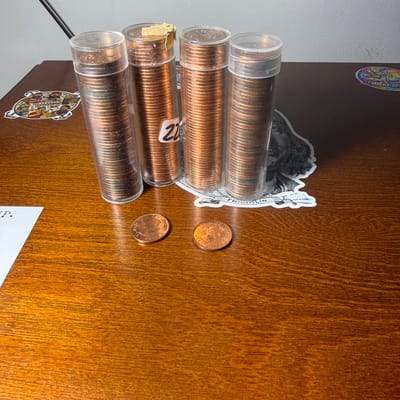 4 uncirculatedrolls of Canadian pennies 1959 to 63 - additional view