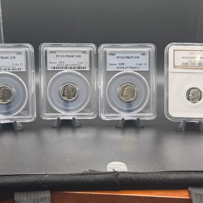 (2) 1963  1. 60 62 proof Roosevelt dimes.