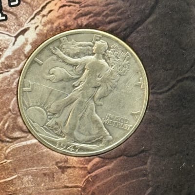 1947 walking liberty in decorative holder