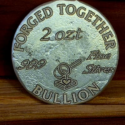 FTB- 2 ozt Hand Poured Fleur de Lis Round .999FS - additional view