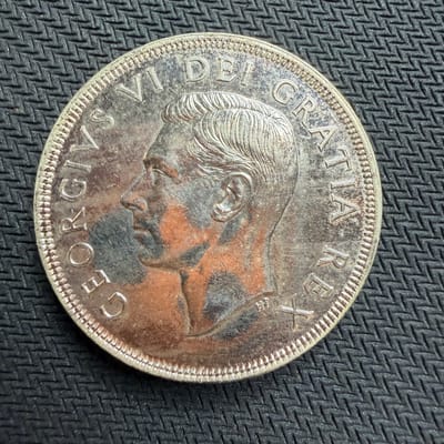 1949 Canada Silver Dollar Toned 23g .800 | ASW 0.6 - additional view