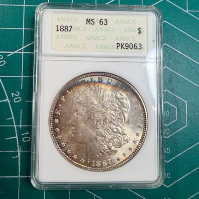 1887 Morgan Dollar Rainbow Toned ANACS MS63