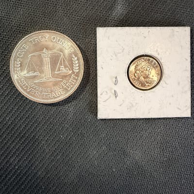 1985 Silver Trade Unit 1 OZ. + A Bonus 2026 Dime