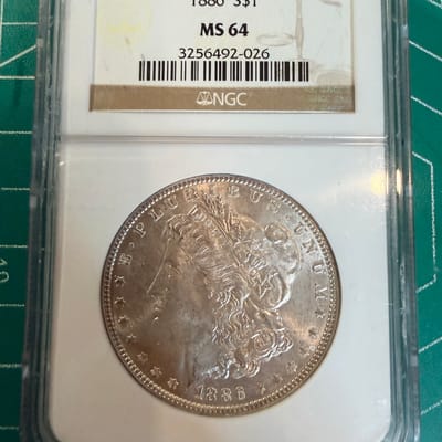 1886 Morgan Silver Dollar MS 64 Toned On Reverse