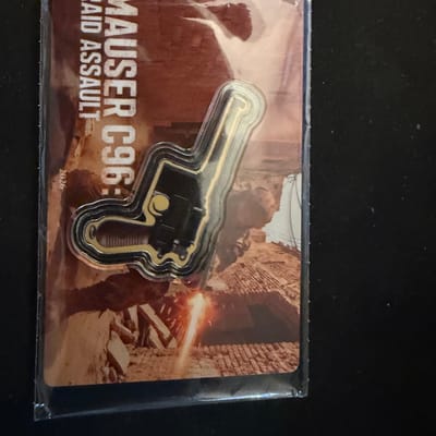 Mauser C96 Raid Assault 1/1000oz .999 Gold Liberia