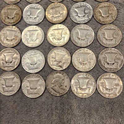 25 Franklins Half Dollars