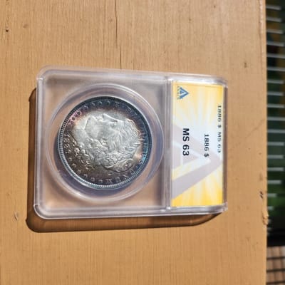 1886 P MORGAN MS63 VIVID BLUE BULLSEYE RAINBOW - additional view