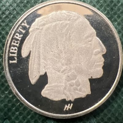 SPOT - 1 oz Buffalo Round .9999 with some milk spo