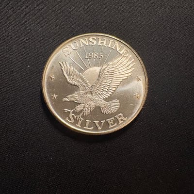 1985 Sunshine Mining 1 oz .999 Fine Silver Round - additional view