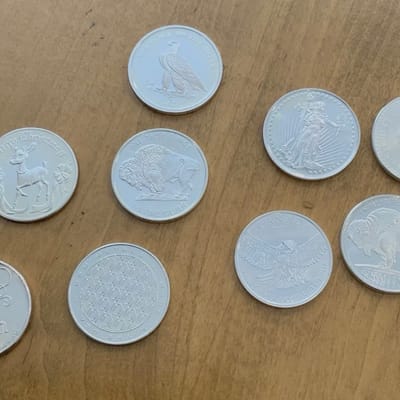 Random 1-oz .999 silver rounds and bars