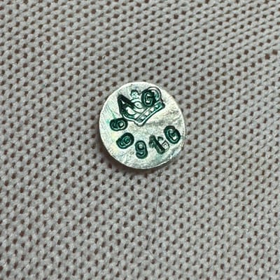 1 Gram of .999 stamped round with green lettering - additional view