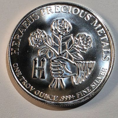 Heraeus Precious Metals 1oz .999+ Fine Silver Round – Roses & Hand Design