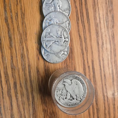 Full roll of walking liberty half dollars