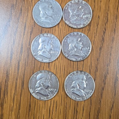 6 Ben Franklin half dollars
