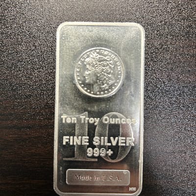 10 oz silver bar weighs perfect .31 kilograms 