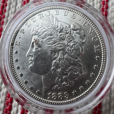 1883  and 1883 O Morgan Dollar UNC