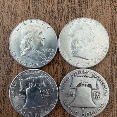 Lot of 4 random US Franklin Half Dollars .9 Silver