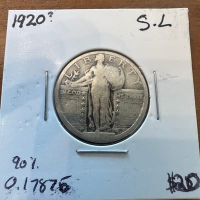 Standing Liberty Quarter. I think it's a 1920
