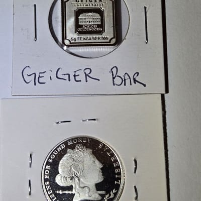 5 gram grieger bar and a 1/5 oz troy 999 silver