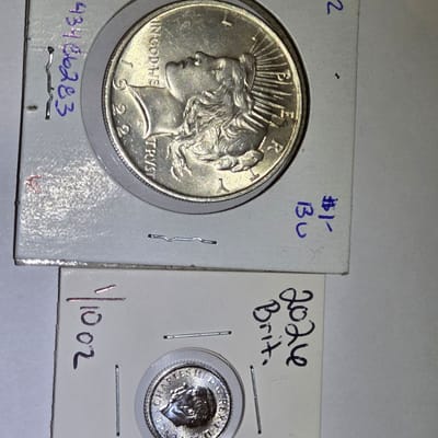 1922 peace dollar and a 2026 1/10th Britannia