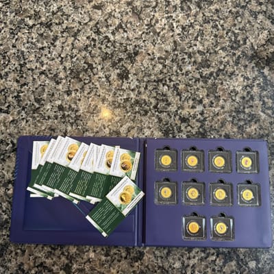 Set of 10 1/1000th oz 0.999 Seahorse gold coins