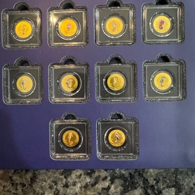 Set of 10 1/1000th oz 0.999 Seahorse gold coins - additional view