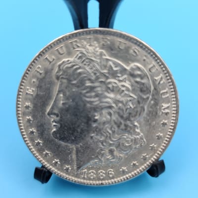 1886 Morgan, 100 Year Old History Of Morgan Dollar - additional view