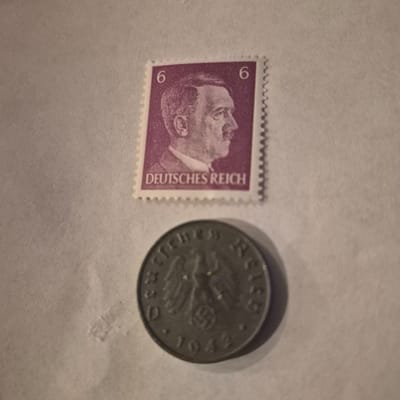 WW2 era German coin with unused stamp.