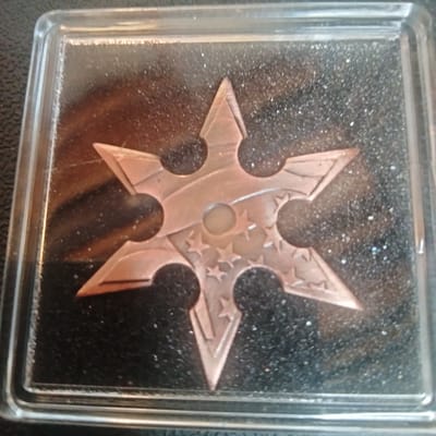 Copper throwing star