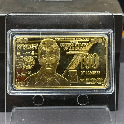 Copper Gold Plated 1oz Bar: Trump 100 bar in Caps