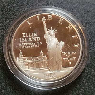 1986-S Ellis Island Commemorative in OGP with COA