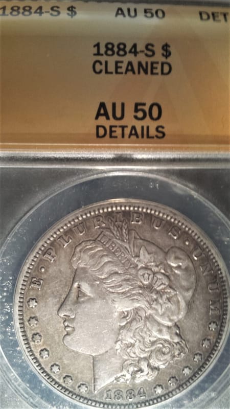 1884-S ANAC AU50 cleaned Morgan dollar - Image 1